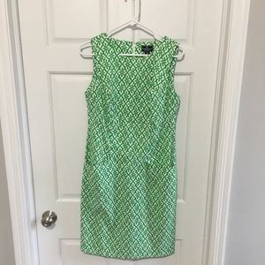 Green and white sleeveless dress